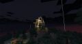 Here is a build, on a hill, at spawn, being worked at with scaffolding surrounding it, for the player to navigate around the build as it progresses. It's lighted up, so it can be seen in the dark night.