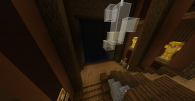 Taken from second floor storage room, the cave spider spawner loomed behind a wall of tinted glass.