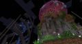 A screenshot of two builds at spawn on the Beagle server. One of the builds is a light pink, giant mushroom build, with leaf bushes, grass, dirt, stone and flowers all around. The other build spirals upwards in black and blue colours, like a DNA string.